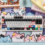 Vibrant Characters Keycap Set glowing with side-lit RGB. This iconic keycap features translucent engravings, showcasing playful art and a premium feel.