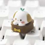 Close-up views of the handcrafted Potted Puppy Artisan Keycap, showcasing its cute resin puppy, intricate layered design, and whimsical charm from multiple design.