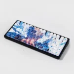 Gojo Satoru backlit side-printed PBT keycaps set, displayed from multiple angles, highlighting the enigmatic luminous legends and premium matte finish.