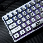 Product gallery of iconic Printstream keycaps set, displaying their dual metallic and ceramic finishes from multiple angles. Observe the dynamic graffiti.