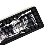 Multiple angles of mystical purple eye PBT keycaps set, showcasing the enigmatic eye motif, translucent side-printed legends, and backlit glow.