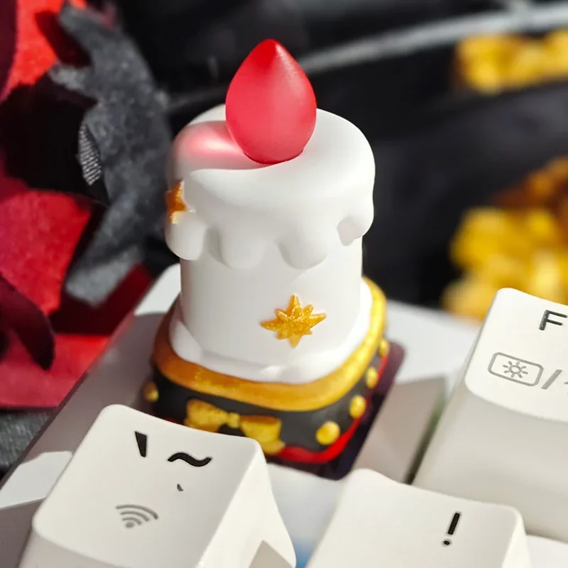 A close-up of a handcrafted resin candle keycap, showcasing intricate layered detail and an ethereal glow, a truly unique artisan desktop charm.