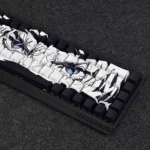 Unique Ripped Manga Side-Lit PBT Keycaps set. Dynamic anime characters on ripped panels, side-lit RGB glow. Artistic views highlight the design.