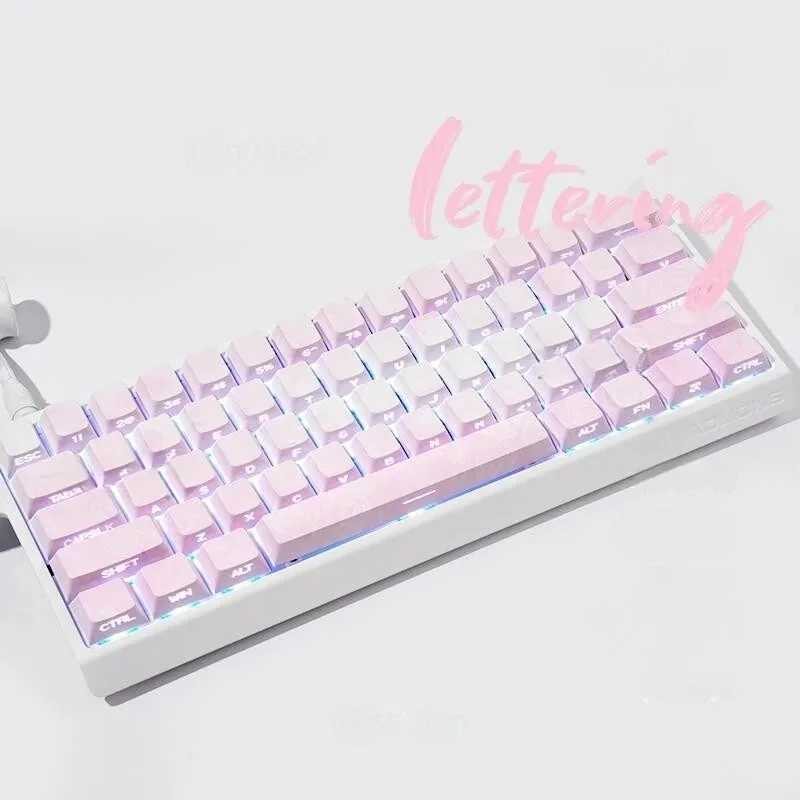 Artistic shot of Rose Coast Luminous Side-Engraved PBT Keycaps Set, revealing soft pink, orange, grey gradients and glowing legends from a unique angle.
