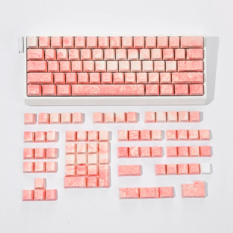 Rose Coast Luminous Side-Engraved PBT Keycap Set in a vibrant orange gradient, evoking serene coastal sunsets with a soft ambient glow for a complete design.