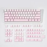A captivating pink Rose Coast Luminous Side-Engraved PBT Keycap Set (131 keys) showcasing a serene coastal gradient with ambient backlighting.