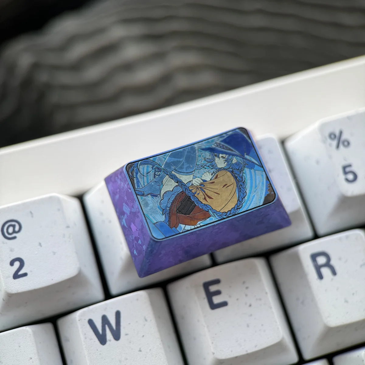 Multiple views of the exclusive Roxy Migurdia Titanium Artisan Keycap, showcasing its sculpted metallic anime artistry and premium titanium finish.