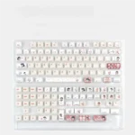 Sesshomaru Inuyasha keycap set from various angles, highlighting its translucent jade-like finish, iconic anime art, and magnetic design.