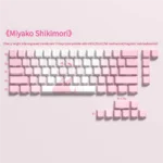 Close-up of Shikimori anime PBT keycaps set showcasing vibrant side-lit legends and crisp character art, highlighting the playful, clean aesthetic.