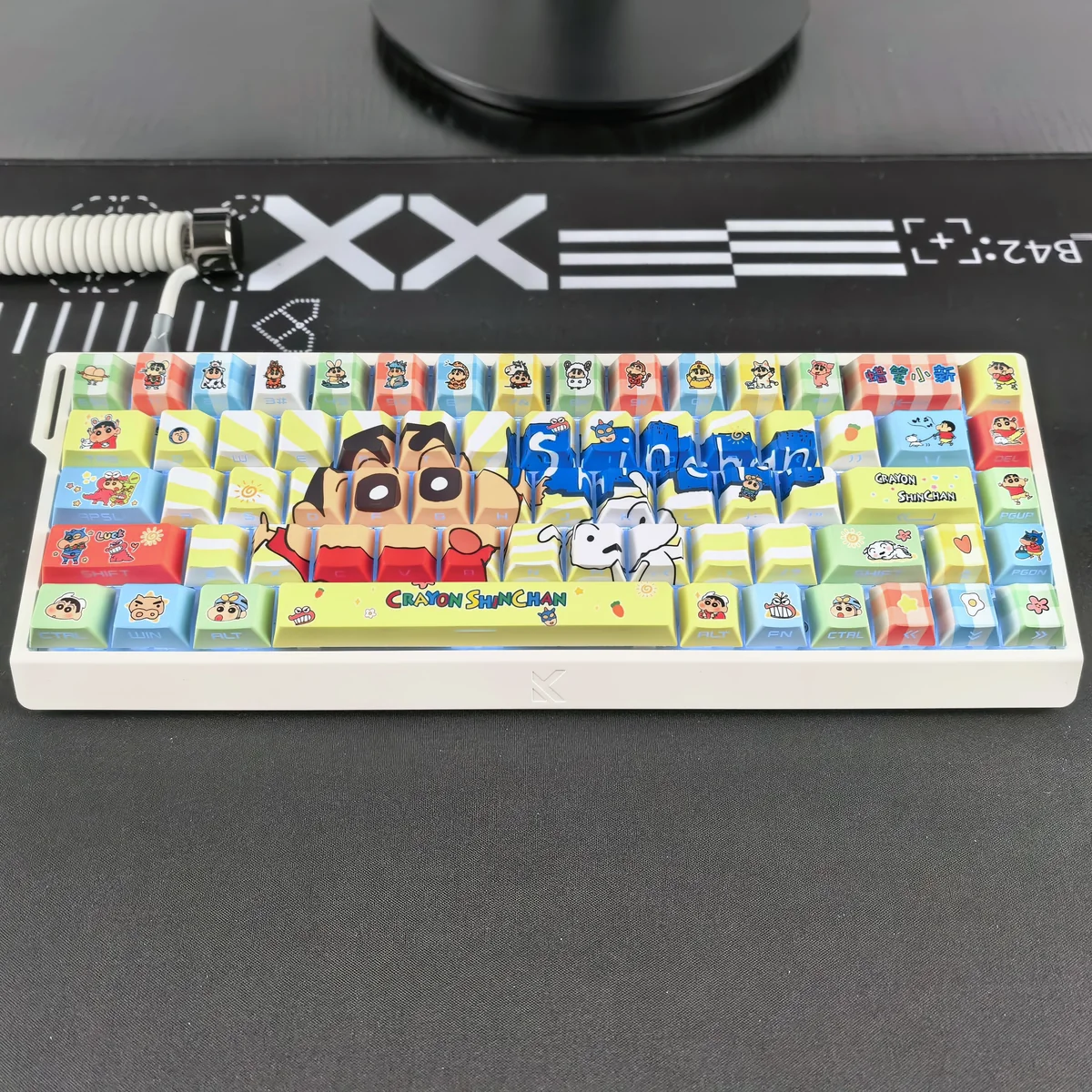 Shin-chan side-print backlit PBT keycaps set. A vibrant gallery showing playful cartoon characters and glowing legends from multiple angles.