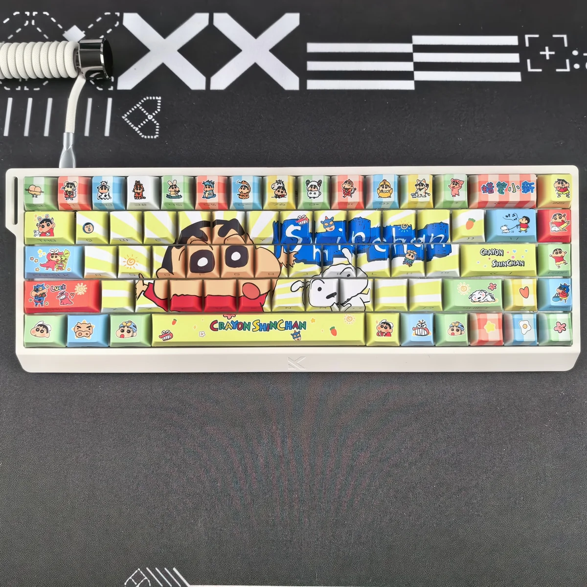 Vibrant Shin-chan Side-Print Backlit PBT Keycaps Set feature iconic cartoon characters glowing with playful charm, perfect for a unique keyboard aesthetic.