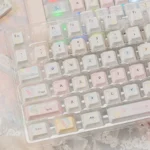 Summer Daydream Keycaps set. Dreamy translucent PBT PC blend with soft pastel gradients. Light-infused tranquil aesthetic, shown from various angles.