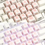 Exquisite handcrafted Ice Crack Heart-Shaped Cherry Supplement Keycap Set in delicate pink, showcasing intricate ice crack patterns and charming heart designs for a unique keyboard.