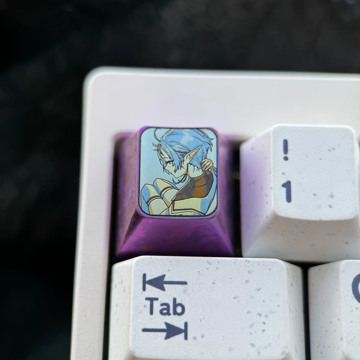 A dazzling premium titanium Sylphiette artisan keycap for ESC, showcasing vibrant anime character art on its polished surface.