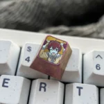 Gallery of the exclusive Eris Boreas Greyrat Titanium Keycap. Vibrant Eris art on polished titanium, shown from multiple premium angles.