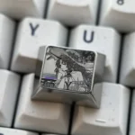 Cartethyia Precision Engraved Titanium Keycap. Detailed views of intricate metallic patterns on aerospace-grade titanium, highlighting industrial elegant design.