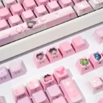 Valorant Clove side-lit PBT keycaps set, showcasing the unique ethereal butterfly design and radiant legends from a striking angle, perfect for fans.