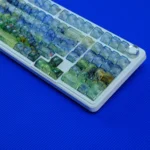 Gallery views of Van Gogh Misty Translucent PC Keycaps Set, highlighting their frosted texture, unique art, and glowing, dreamlike backlighting.