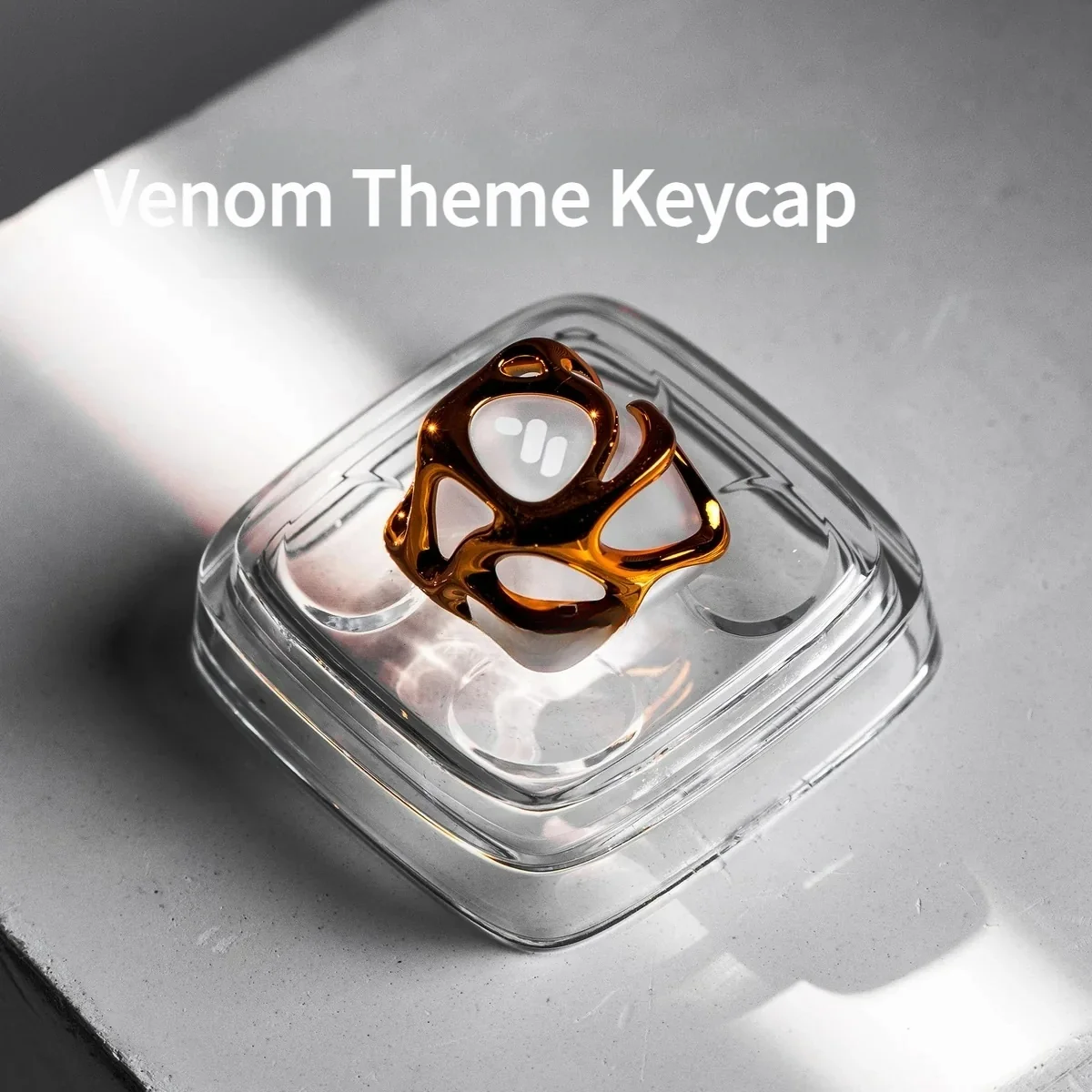 Handcrafted Venom keycap gallery revealing its dark alloy and transparent resin power, detailed from multiple captivating angles.