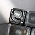 Detailed view of the handcrafted alloy and transparent resin Venom keycap, highlighting its dark, edgy design and metallic power from another perspective.