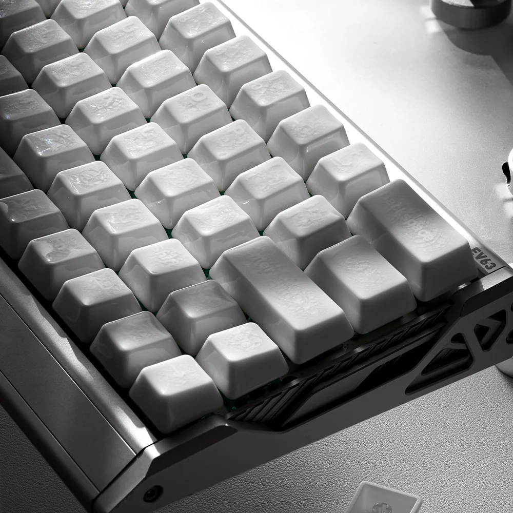 Close-up views of the handcrafted ice crack ceramic keycaps set, showcasing their unique natural crackle texture and translucent white elegance from various angles.