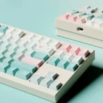 Winter Angler PBT dye-sub keycaps set, shown from various perspectives, reveal the unique hues. Durable, artistic keycaps.