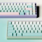 Detailed view of Winter Angler PBT dye-sub keycaps set, showcasing crisp hues legends on durable keycaps, capturing the serene winter theme.