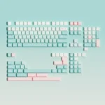 Winter Angler PBT dye-sub keycaps set, detailed shot from an elevated angle, highlighting the tranquil theme. Durable PBT ensures lasting design.