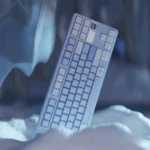 Winter Serenity PBT keycaps set, showcasing multiple angles of the durable Cherry profile design with frosty blues, crisp whites, and cool grays, evoking.