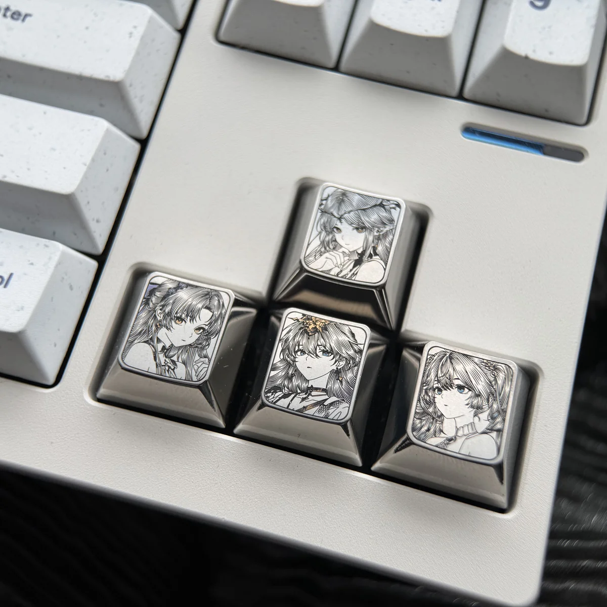 Close-up of a precision-crafted Wuthering Waves titanium keycap, featuring vibrant and highly detailed character art engraving.