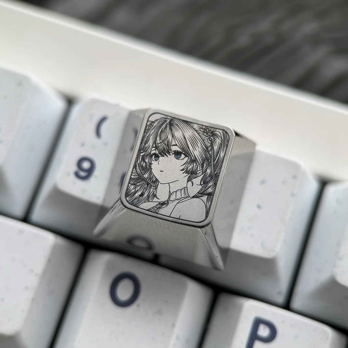 A stunning Iuno Wuthering Waves ESC keycap, precision-carved from iridescent titanium, showcasing intricate futuristic character art.