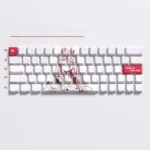 Angled shot of the iconic Zero Two side-printed backlit PBT keycaps set, revealing the minimalist legends and a vibrant pink-red glow.