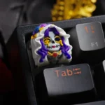 "Close-up view of a handcrafted translucent resin Zombie Bride & Groom Keycaps, revealing its darkly romantic, whimsical gothic character and eerie glow from multiple angles.
