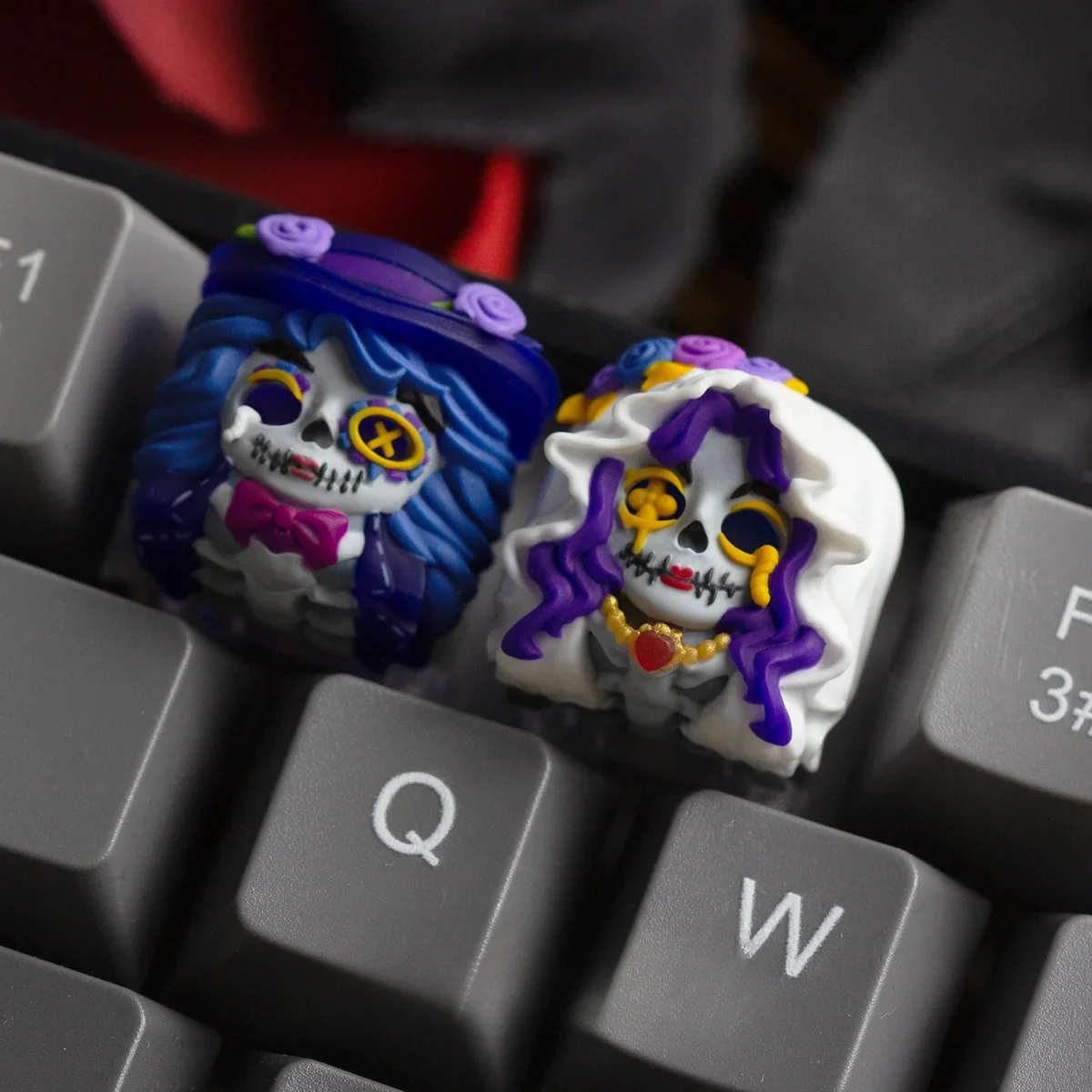 Handcrafted translucent Zombie Bride & Groom Keycaps featuring a whimsical gothic character, glowing eerily. A unique piece of resin art for keyboard enthusiasts.