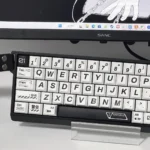 Product gallery showing durable 01 Japanese PBT keycaps set from various angles, highlighting crisp dye-sublimated Kanji legends and a premium, minimalist design.