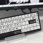 Detailed views of the durable 01 Japanese PBT keycaps set, showcasing crisp dye-sublimated Kanji legends and a clean, minimalist aesthetic from various angles.