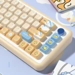Vibrant PBT keycaps set featuring adorable, whimsical cartoon duck designs, shown from multiple angles to highlight their durable quality and playful charm.