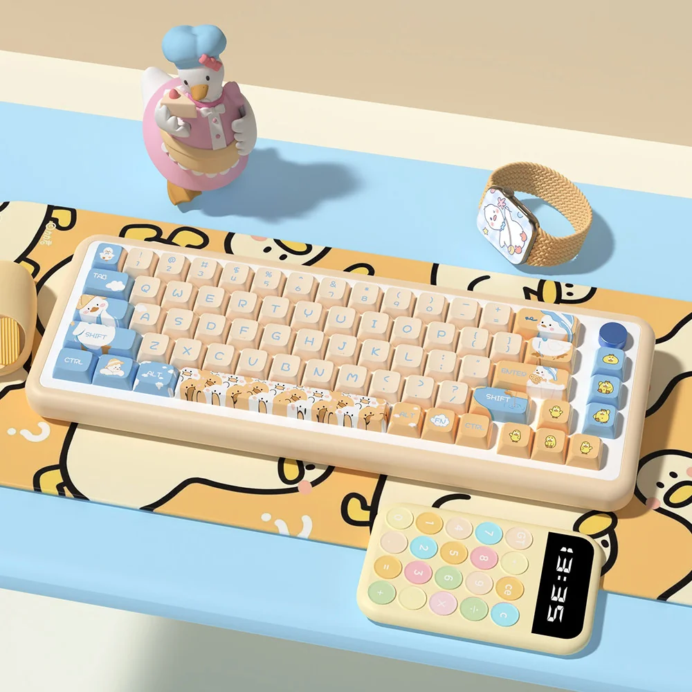Adorable PBT duck keycaps set featuring playful, cartoonish yellow ducks, perfect for adding whimsical charm and durability to your keyboard.