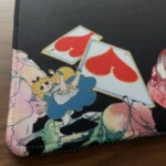 Whimsical Alice Wonderland Mouse Pad, featuring its enchanting, vibrant dreamscape design from multiple angles, perfect for creative spaces.