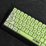 Vibrant graffiti PBT keycaps set displayed, featuring bold, expressive urban street art designs and durable PBT quality.