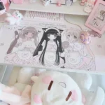 Whimsical Angelic maid extra-large desk mat in pastel pink, featuring playful characters and sweet desserts for a kawaii office.