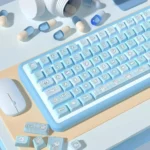 Multi-angle views of the adorable Aqua Kitten PBT MDA keycaps set, with playful kitten designs in calming aqua, revealing serene charm.