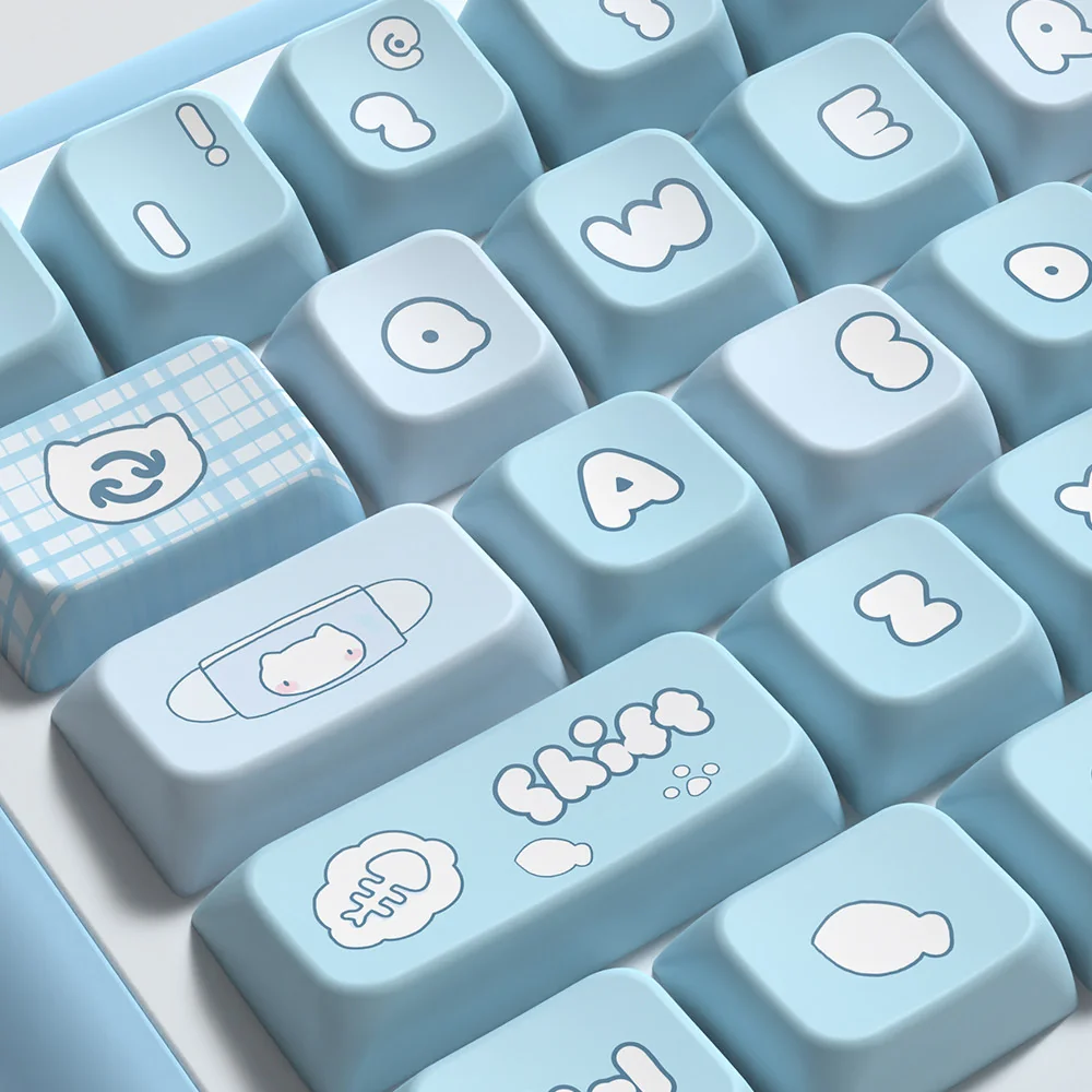 Adorable Aqua Kitten PBT MDA keycaps set shown from multiple angles, highlighting calming aqua hues and whimsical kitten illustrations for a playful keyboard.
