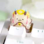 A whimsical handcrafted resin Sea Hare Artisan Keycap, showcasing intricate details and an enchanting underwater world, perfect for custom keyboards.