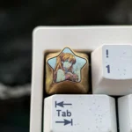 Premium Asuka Langley Soryu titanium keycap, featuring fiery colors, a striking star pentagon, and a polished finish, ideal for anime collectors.