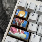 Vibrant Asuka Titanium Keycap, showcasing its premium metallic finish and iconic anime design from a distinct angle for custom anime keyboards.