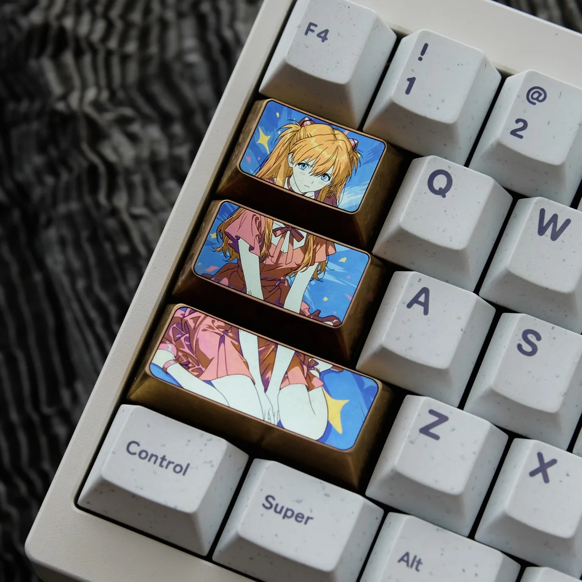 Vibrant Asuka Titanium Keycap Set displaying its premium metallic finish and iconic anime character art, ideal for custom anime keyboards.