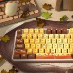 Detailed views of the Autumn Serenity PBT Dye-Sub Keycap Set, highlighting its durable PBT structure, artistic autumn leaf designs, and tranquil warm.
