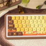 An artistic view of the Autumn Glow MDA PBT Dye-Sub Keycap Set, highlighting its warm earthy tones and subtle seasonal motifs, evoking comfort and nature setup.