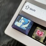 Sleek, premium Ayanami Rei Titanium Alloy Keycap from Evangelion, showcased from multiple angles. This iconic anime-inspired design offers a metallic setup.